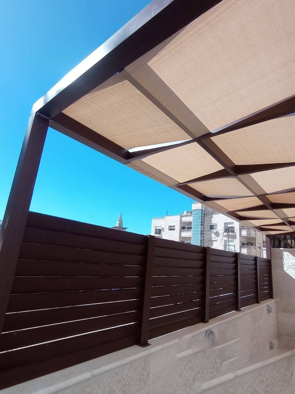 Custom Design & Installation: Aluminum Wood Finish Gates, Fences, Garage Doors, and Seasonal Pergolas - الصورة 17