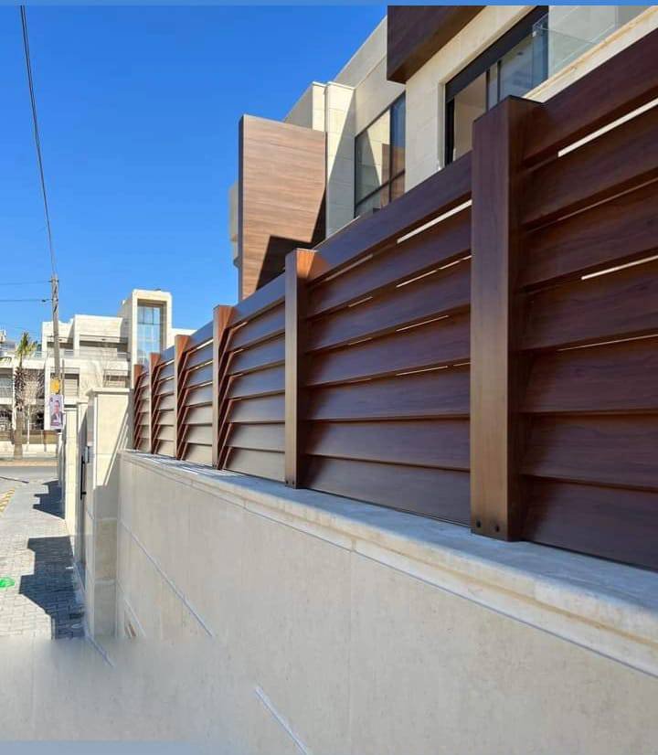 Custom Design & Installation: Aluminum Wood Finish Gates, Fences, Garage Doors, and Seasonal Pergolas - الصورة 20
