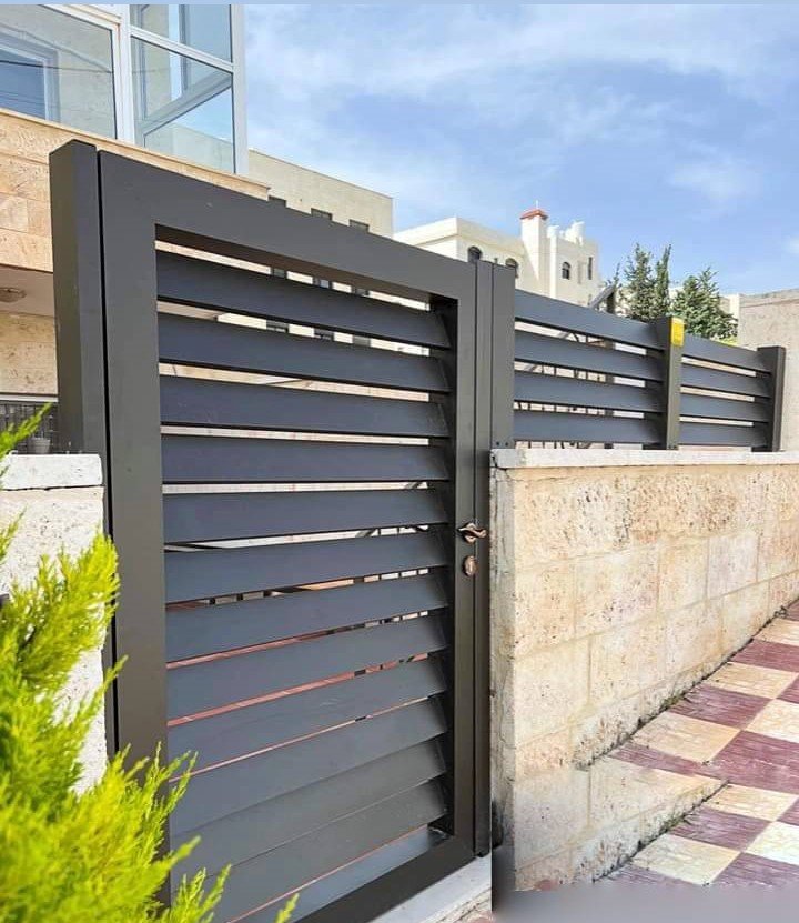 Custom Design & Installation: Aluminum Wood Finish Gates, Fences, Garage Doors, and Seasonal Pergolas - الصورة 22
