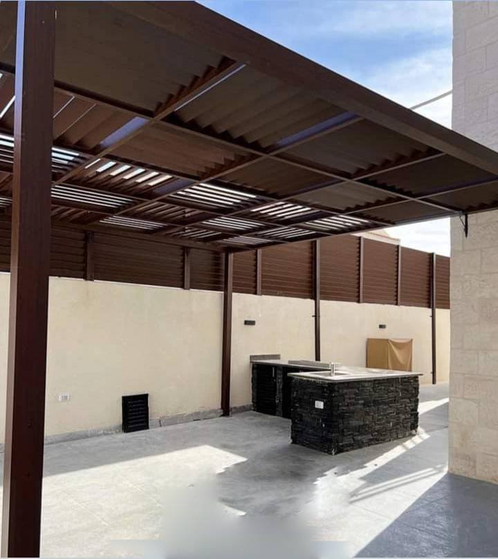 Custom Design & Installation: Aluminum Wood Finish Gates, Fences, Garage Doors, and Seasonal Pergolas - الصورة 6